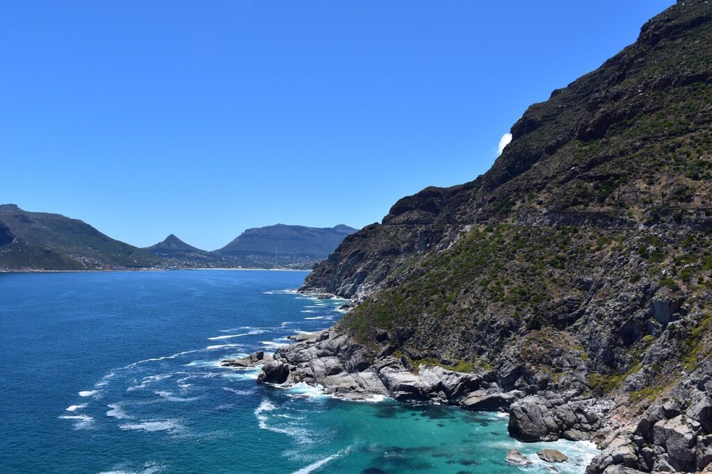 Mountains touching the Atlantic ocean, which is pristine and blue, another great example of Cape Town beaches splendour