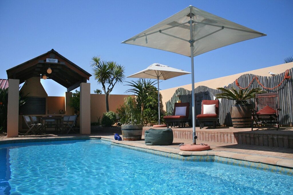 Spackling private pool with loungers and a lapa around it, a great place to unwind at this accommodation at Mossel Bay